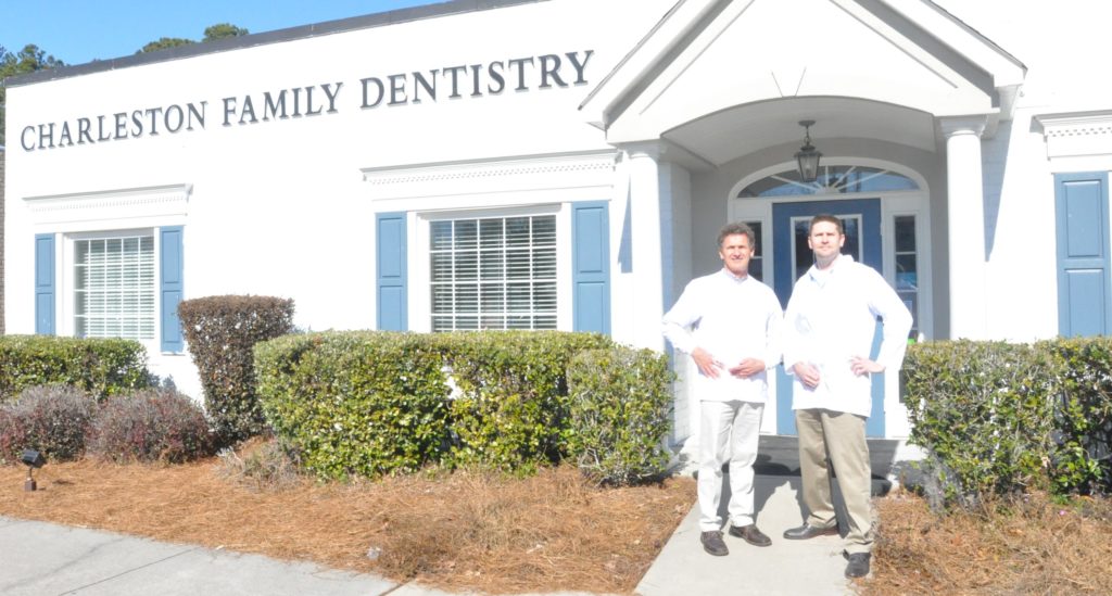 Dr. Barrows and Dr. Kirkland standing outside of Charleston Family Dentistry