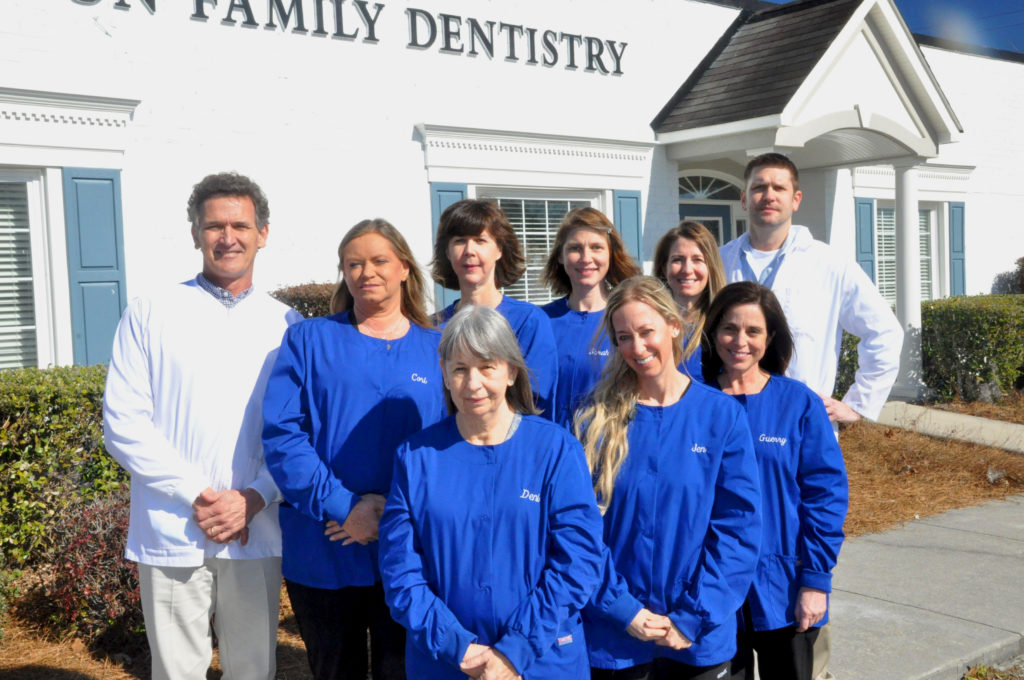 Charleston Family Dentistry staff smiling outside the office